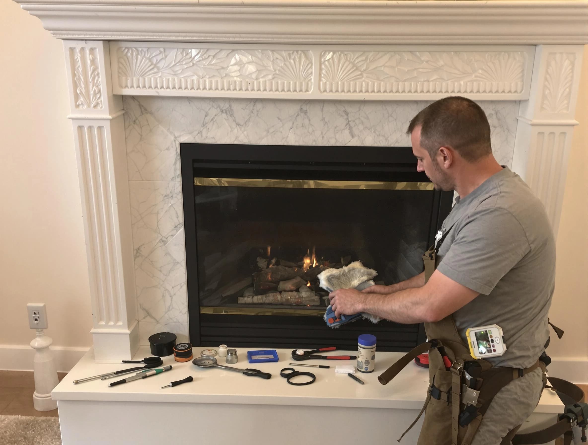 Cecil Chimney Sweep performing fireplace maintenance in Cecil, PA